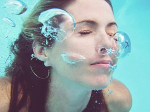 Underwater portrait of a young woman